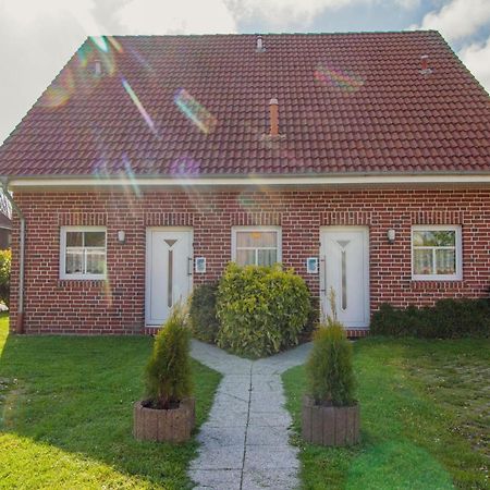 Haus Leuchtturm - Ebbe Appartement Krummhörn Buitenkant foto