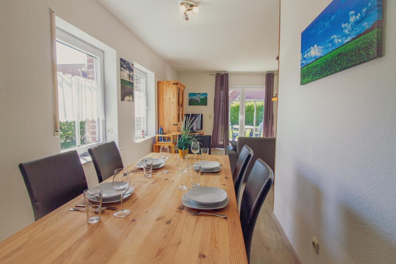 Haus Leuchtturm - Ebbe Appartement Krummhörn Buitenkant foto
