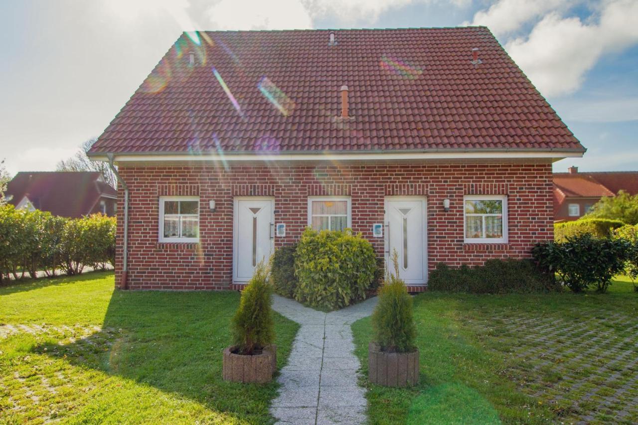Haus Leuchtturm - Ebbe Appartement Krummhörn Buitenkant foto