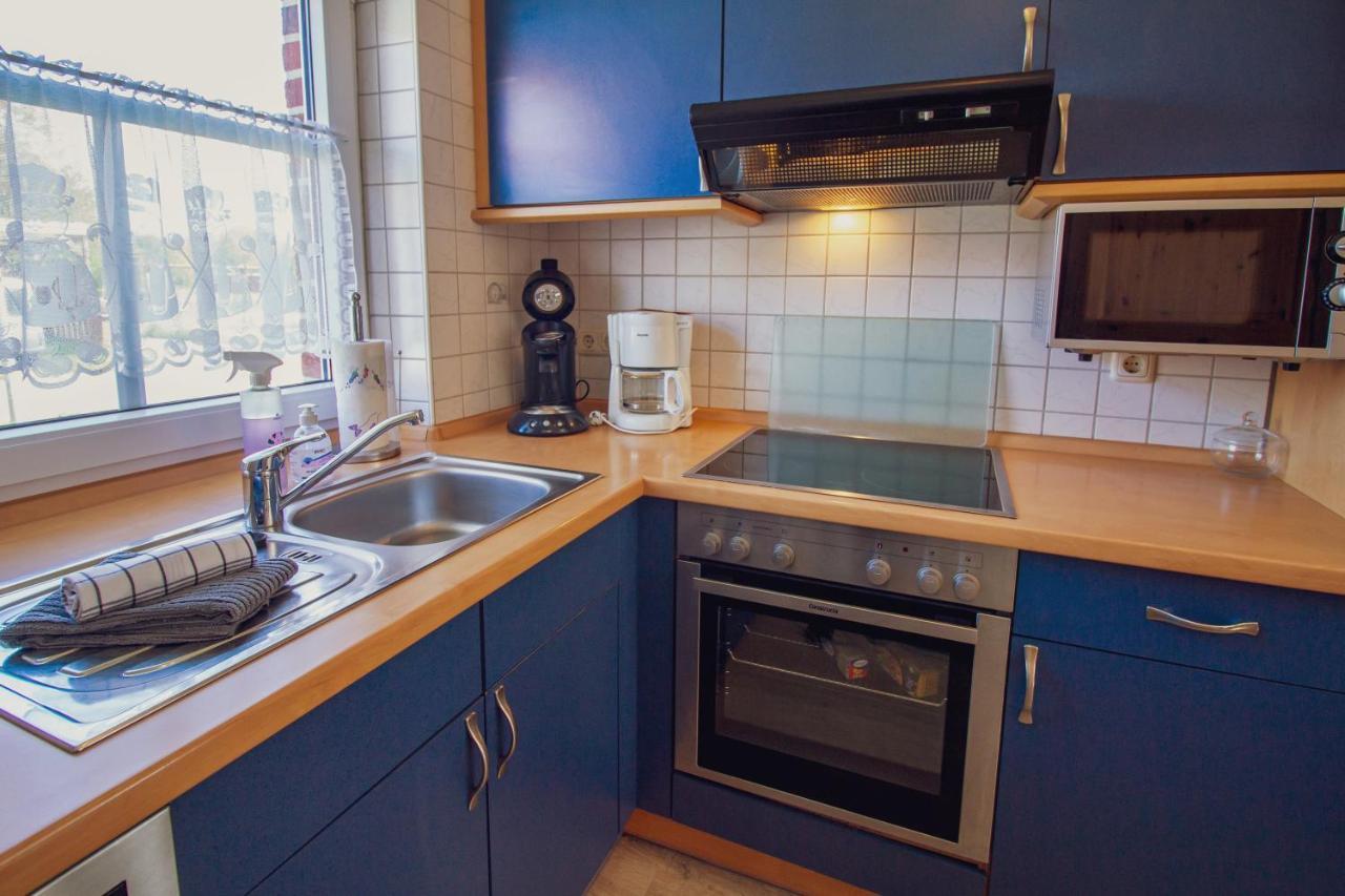 Haus Leuchtturm - Ebbe Appartement Krummhörn Buitenkant foto