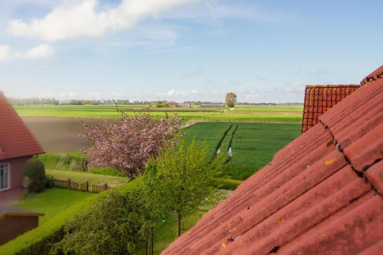 Haus Leuchtturm - Ebbe Appartement Krummhörn Buitenkant foto