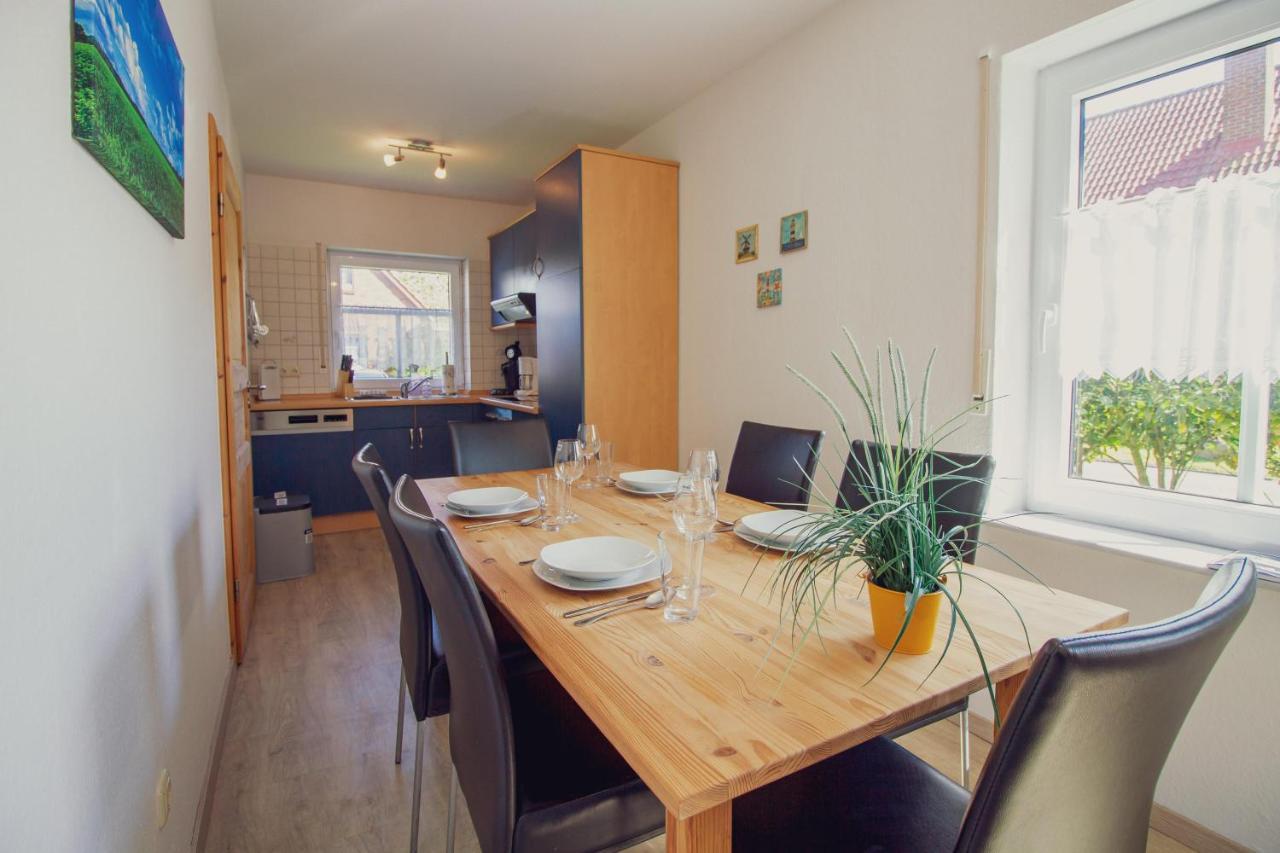 Haus Leuchtturm - Ebbe Appartement Krummhörn Buitenkant foto