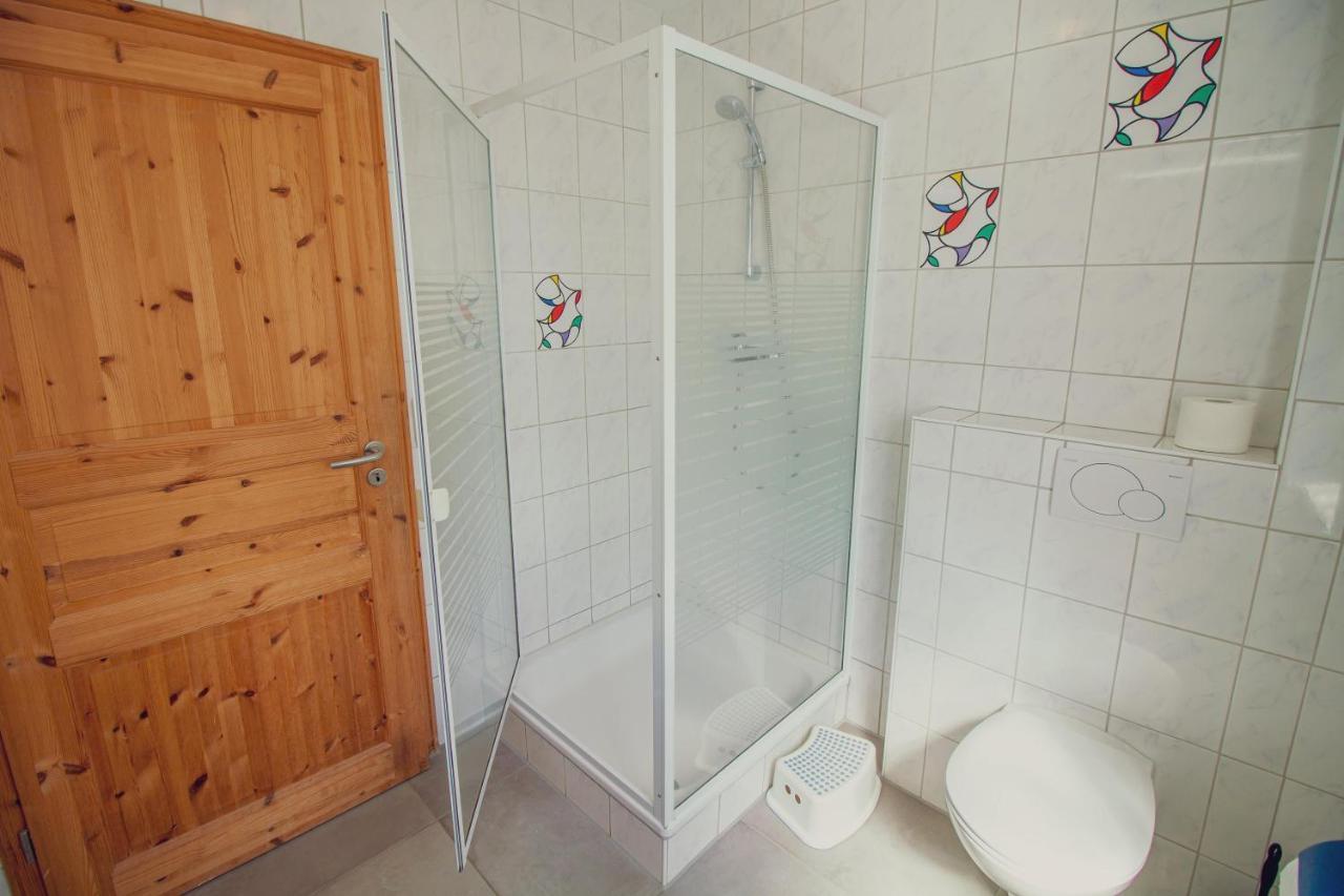 Haus Leuchtturm - Ebbe Appartement Krummhörn Buitenkant foto