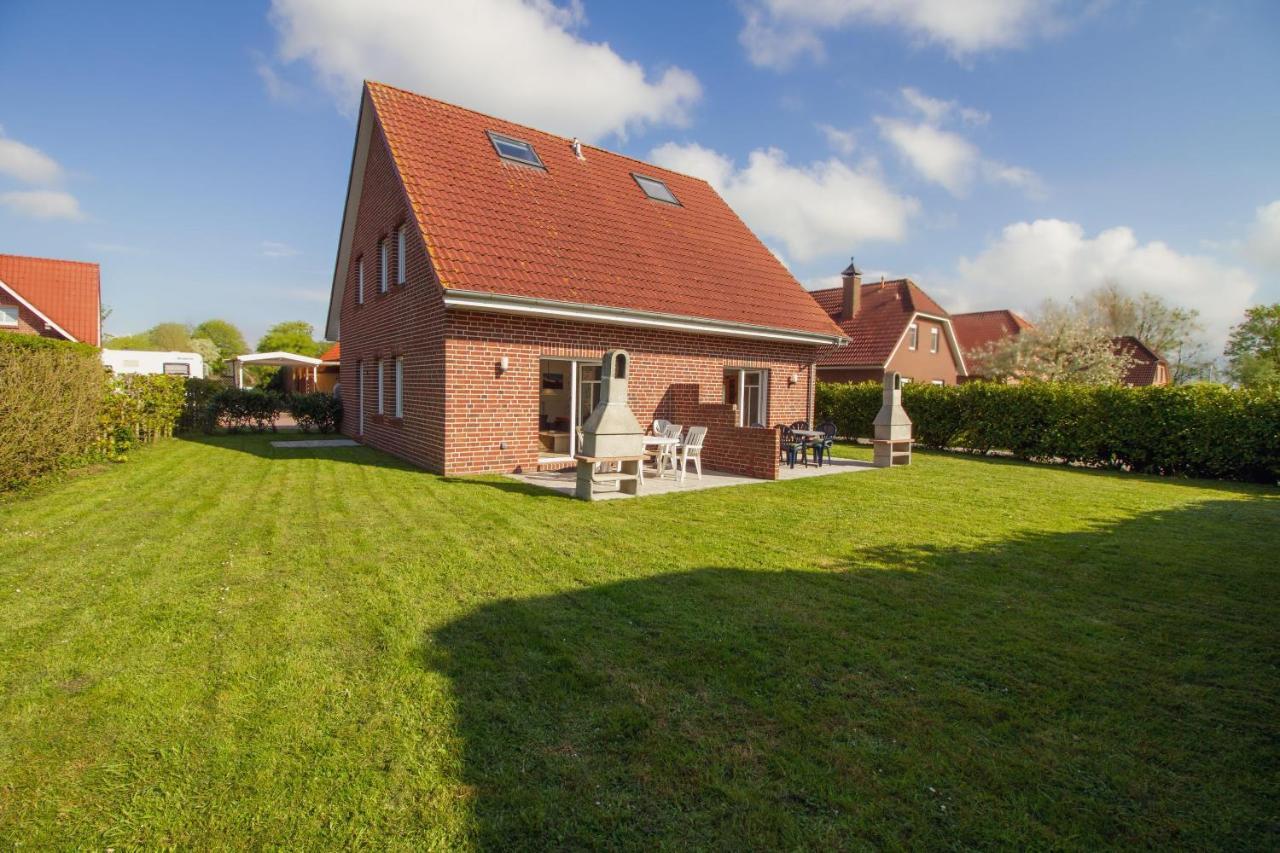 Haus Leuchtturm - Ebbe Appartement Krummhörn Buitenkant foto