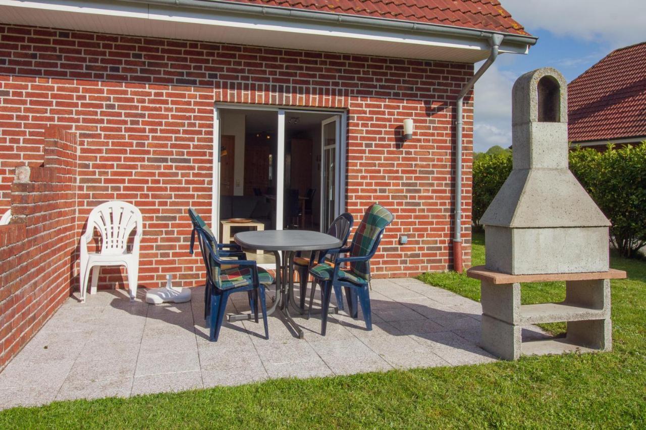 Haus Leuchtturm - Ebbe Appartement Krummhörn Buitenkant foto