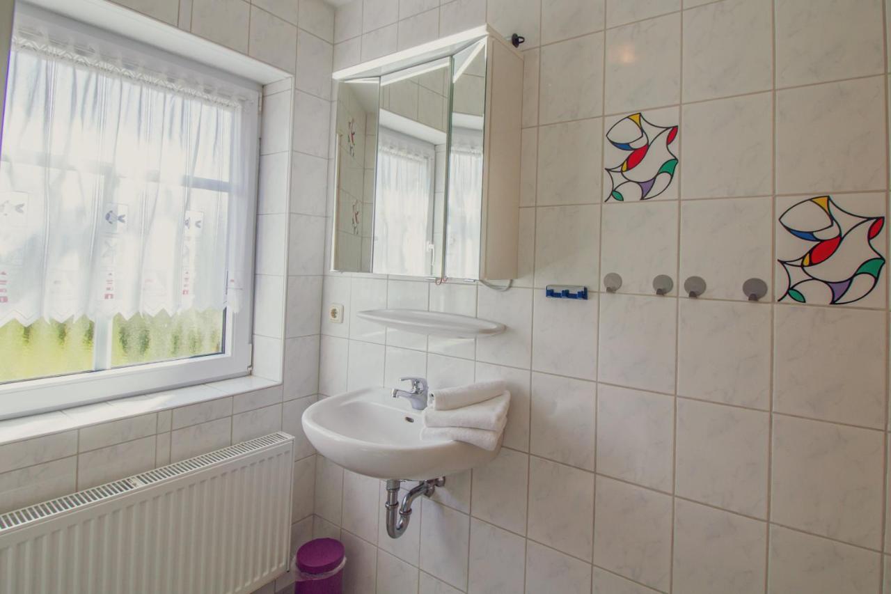 Haus Leuchtturm - Ebbe Appartement Krummhörn Buitenkant foto