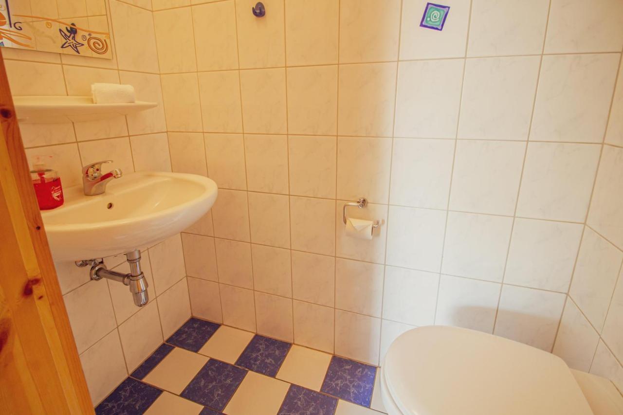Haus Leuchtturm - Ebbe Appartement Krummhörn Buitenkant foto